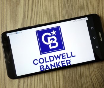 KONSKIE, POLAND - December 21, 2019: Coldwell Banker Real Estate Llc logo on mobile phone